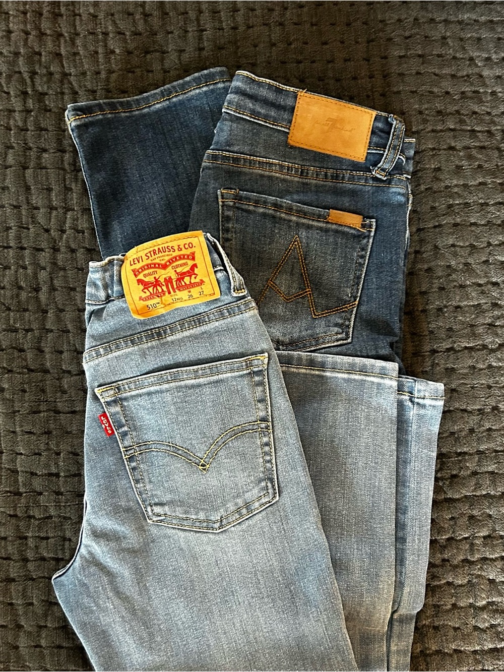 Boys Levi’s and 7 For All Mankind jeans